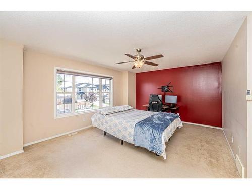 57 Saddlecrest Park Ne, Calgary, AB - Indoor Photo Showing Bedroom