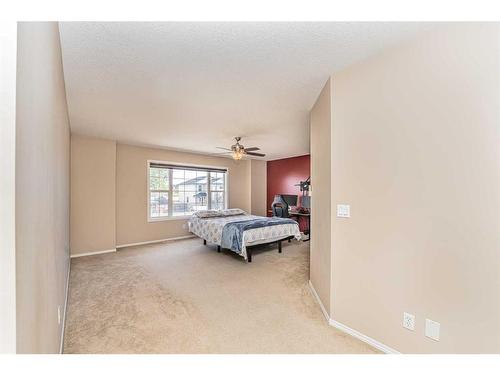 57 Saddlecrest Park Ne, Calgary, AB - Indoor Photo Showing Bedroom