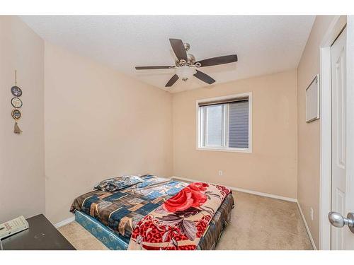 57 Saddlecrest Park Ne, Calgary, AB - Indoor Photo Showing Bedroom