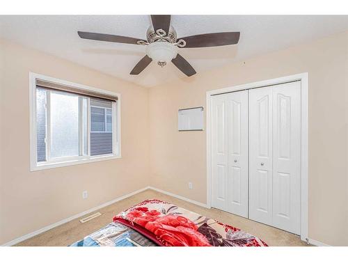 57 Saddlecrest Park Ne, Calgary, AB - Indoor Photo Showing Bedroom