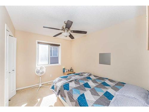 57 Saddlecrest Park Ne, Calgary, AB - Indoor Photo Showing Bedroom