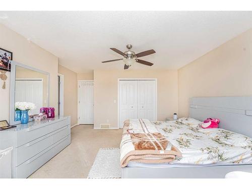 57 Saddlecrest Park Ne, Calgary, AB - Indoor Photo Showing Bedroom