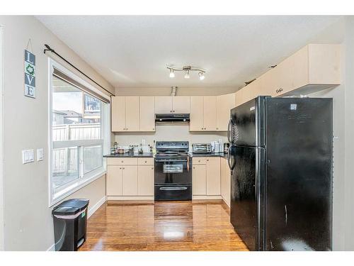 57 Saddlecrest Park Ne, Calgary, AB - Indoor Photo Showing Kitchen