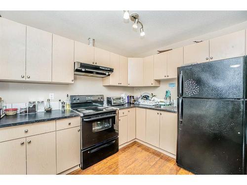 57 Saddlecrest Park Ne, Calgary, AB - Indoor Photo Showing Kitchen