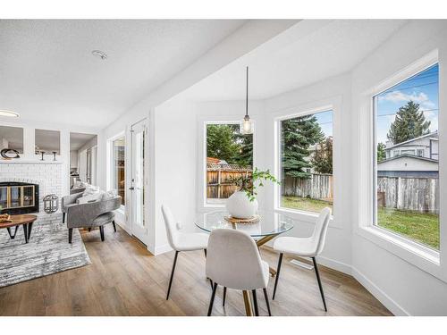 103 Hawkhill Place Nw, Calgary, AB - Indoor Photo Showing Other Room With Fireplace