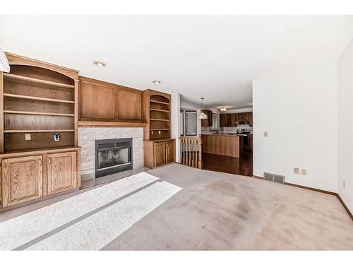 513 Hawkstone Drive Nw, Calgary, AB - Indoor With Fireplace