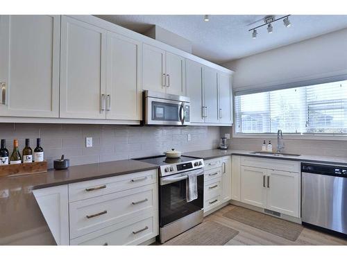 428 Nolan Hill Boulevard Nw, Calgary, AB - Indoor Photo Showing Kitchen With Stainless Steel Kitchen With Upgraded Kitchen