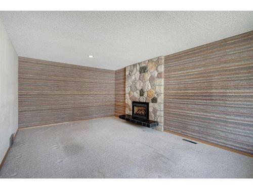 5848 Lodge Crescent Sw, Calgary, AB - Indoor With Fireplace