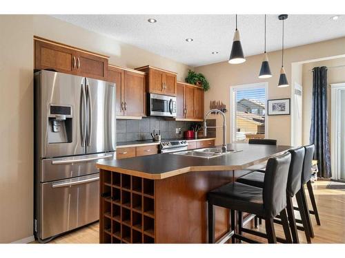 67 Elgin View Se, Calgary, AB - Indoor Photo Showing Kitchen With Stainless Steel Kitchen With Double Sink