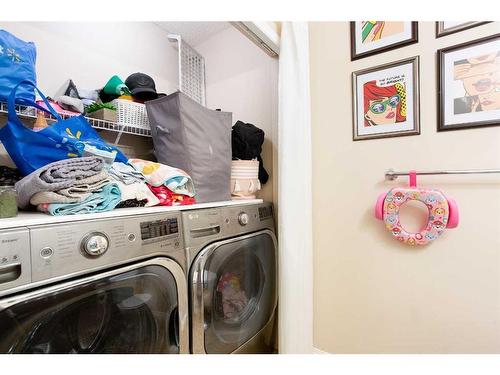 184 Hidden Creek Gardens Nw, Calgary, AB - Indoor Photo Showing Laundry Room