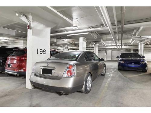 1605-4641 128 Avenue Ne, Calgary, AB - Indoor Photo Showing Garage