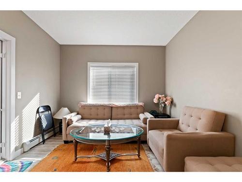 1605-4641 128 Avenue Ne, Calgary, AB - Indoor Photo Showing Living Room