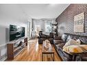 2112-5605 Henwood Street Sw, Calgary, AB  - Indoor Photo Showing Living Room 