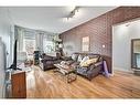 2112-5605 Henwood Street Sw, Calgary, AB  - Indoor Photo Showing Living Room 