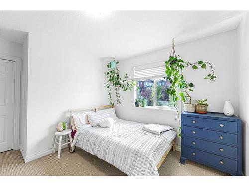 7 Jumping Pound Terrace, Cochrane, AB - Indoor Photo Showing Bedroom