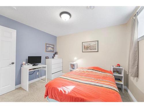 7 Jumping Pound Terrace, Cochrane, AB - Indoor Photo Showing Bedroom