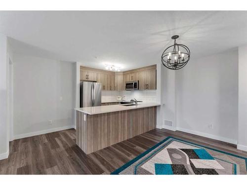 2313-6118 80 Avenue Ne, Calgary, AB - Indoor Photo Showing Kitchen