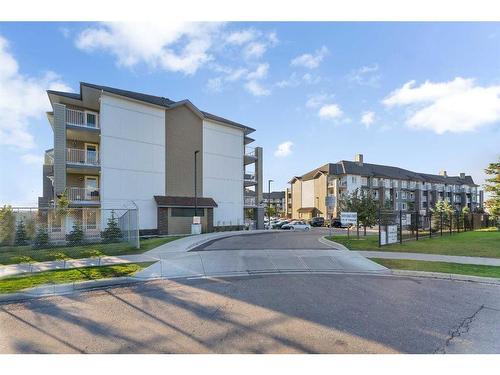 2313-6118 80 Avenue Ne, Calgary, AB - Outdoor With Balcony With Facade