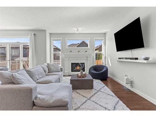 305 Evanspark Gardens Nw, Calgary, AB - Indoor Photo Showing Living Room With Fireplace