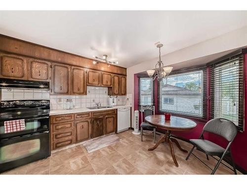 88 Templeson Way Ne, Calgary, AB - Indoor Photo Showing Kitchen With Double Sink