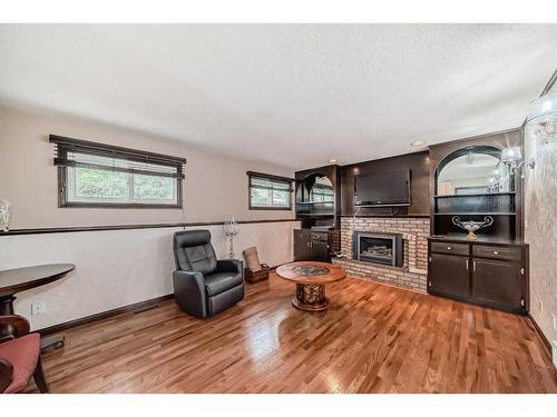 88 Templeson Way Ne, Calgary, AB - Indoor Photo Showing Living Room With Fireplace