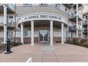 211-92 Saddletree Court Ne, Calgary, AB  - Outdoor With Balcony With Facade 