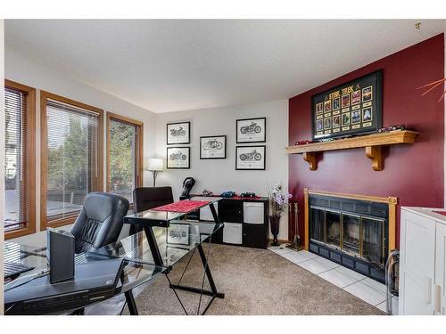 5724 58 Avenue, Olds, AB - Indoor Photo Showing Office With Fireplace