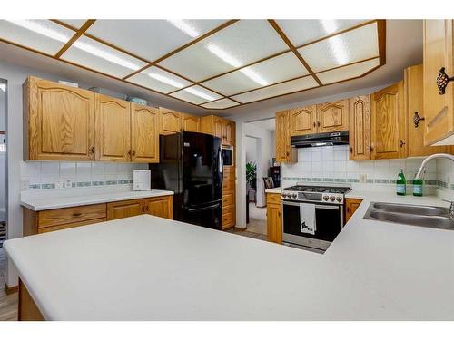 5724 58 Avenue, Olds, AB - Indoor Photo Showing Kitchen With Double Sink