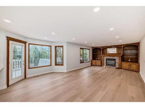 108 Cove Road, Chestermere, AB - Indoor Photo Showing Living Room With Fireplace