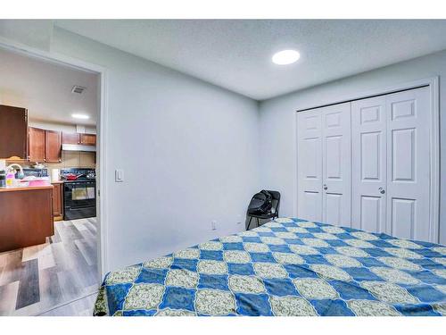 11 Saddlebrook Way Ne, Calgary, AB - Indoor Photo Showing Bedroom