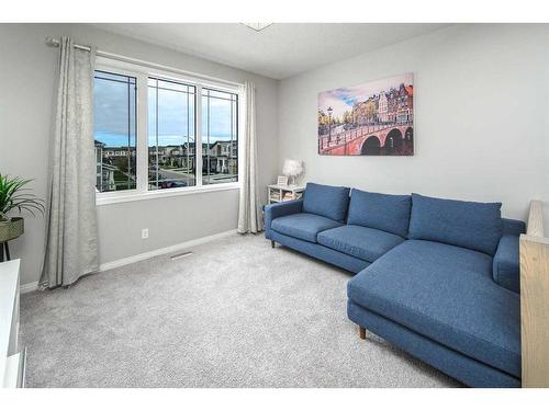 24 Carrington Rise Nw, Calgary, AB - Indoor Photo Showing Living Room