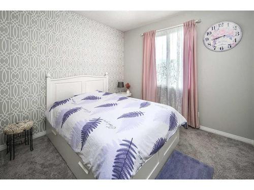 24 Carrington Rise Nw, Calgary, AB - Indoor Photo Showing Bedroom