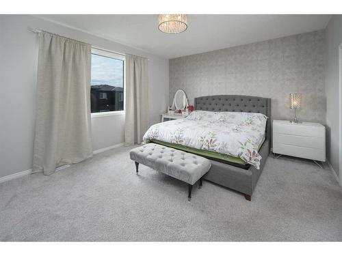 24 Carrington Rise Nw, Calgary, AB - Indoor Photo Showing Bedroom