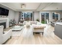 24 Carrington Rise Nw, Calgary, AB  - Indoor Photo Showing Living Room With Fireplace 