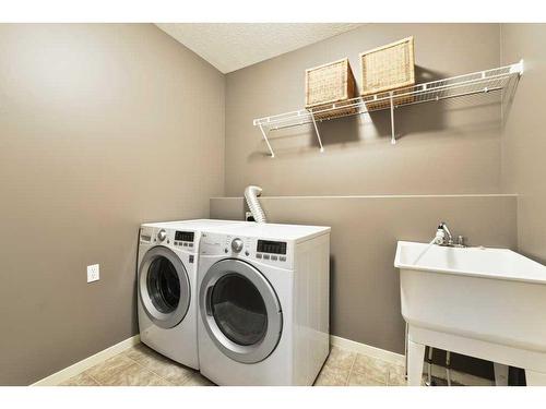 382 Discovery Ridge Boulevard Sw, Calgary, AB - Indoor Photo Showing Laundry Room