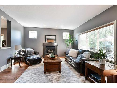 382 Discovery Ridge Boulevard Sw, Calgary, AB - Indoor Photo Showing Living Room With Fireplace