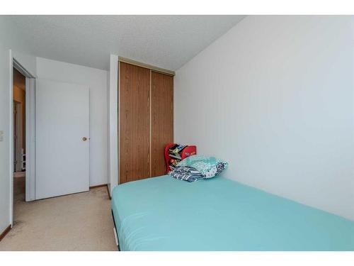 23-2511 38 Street Ne, Calgary, AB - Indoor Photo Showing Bedroom