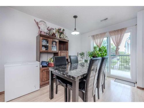 23-2511 38 Street Ne, Calgary, AB - Indoor Photo Showing Dining Room