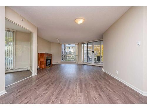 206-804 3 Avenue Sw, Calgary, AB - Indoor With Fireplace