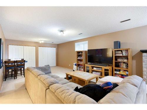 62 Shawbrooke Crescent Sw, Calgary, AB - Indoor Photo Showing Living Room