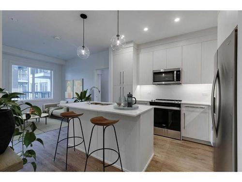 1121-395 Skyview Parkway Ne, Calgary, AB - Indoor Photo Showing Kitchen With Upgraded Kitchen