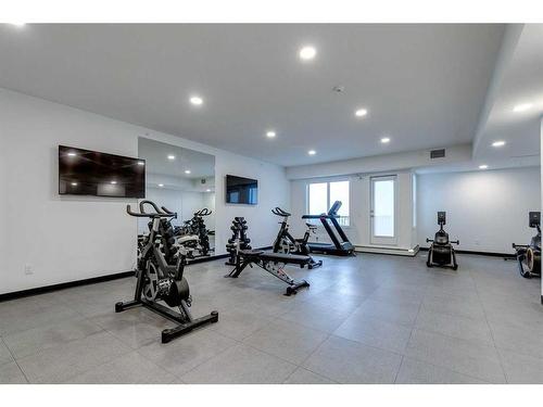 1121-395 Skyview Parkway Ne, Calgary, AB - Indoor Photo Showing Gym Room