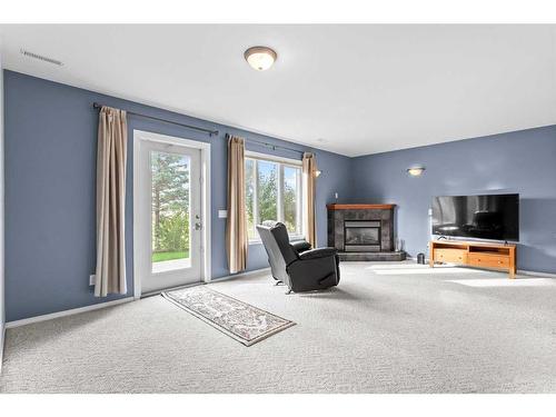 752 Stonehaven Drive, Carstairs, AB - Indoor With Fireplace