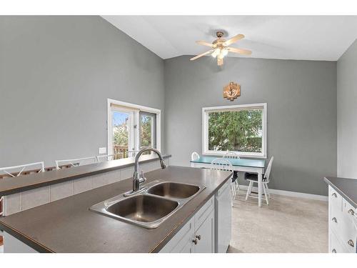 752 Stonehaven Drive, Carstairs, AB - Indoor Photo Showing Kitchen With Double Sink