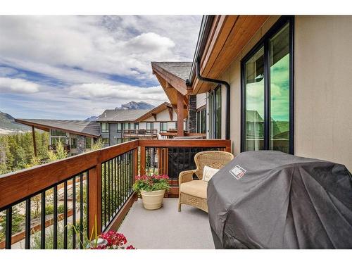 310-106 Stewart Creek Rise, Canmore, AB - Outdoor With Exterior