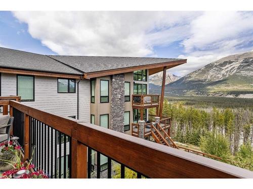 310-106 Stewart Creek Rise, Canmore, AB - Outdoor With Exterior