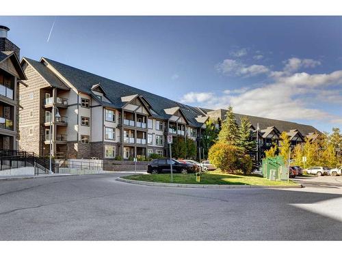 219-15 Aspenmont Heights Sw, Calgary, AB - Outdoor With Balcony With Facade