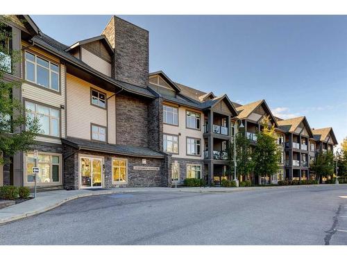 219-15 Aspenmont Heights Sw, Calgary, AB - Outdoor With Balcony With Facade