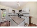 234 Fairmont Boulevard, Lethbridge, AB  - Indoor Photo Showing Kitchen With Double Sink 