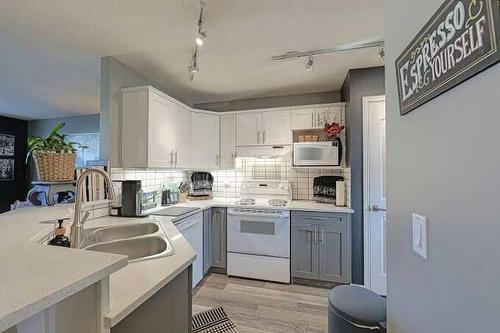 130 Cramond Place Se, Calgary, AB - Indoor Photo Showing Kitchen With Double Sink